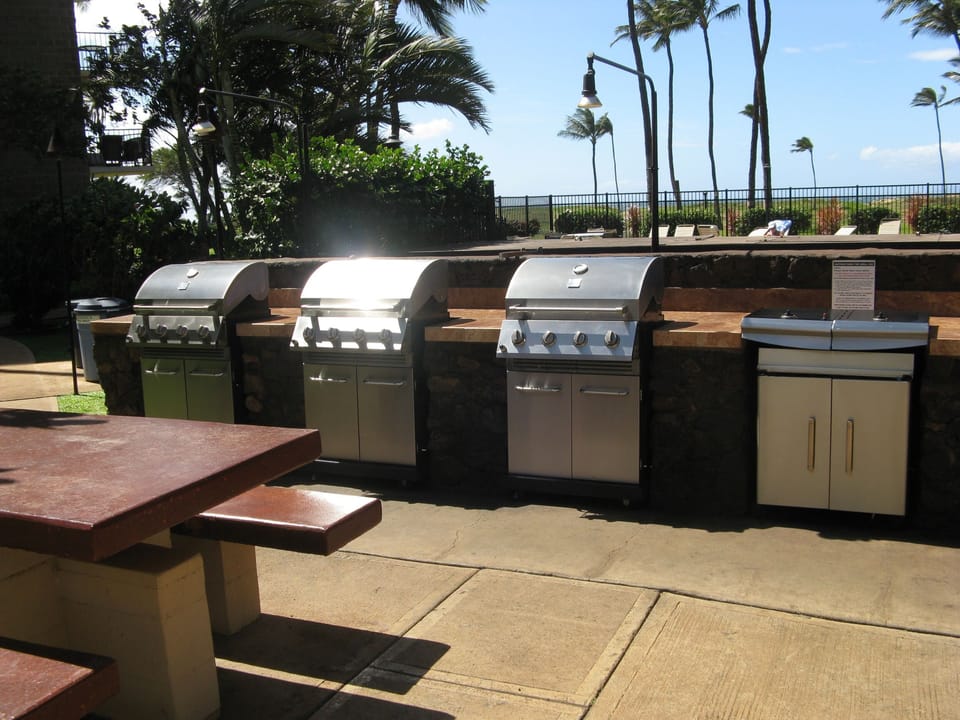   Poolside BBQ area with ocean view.