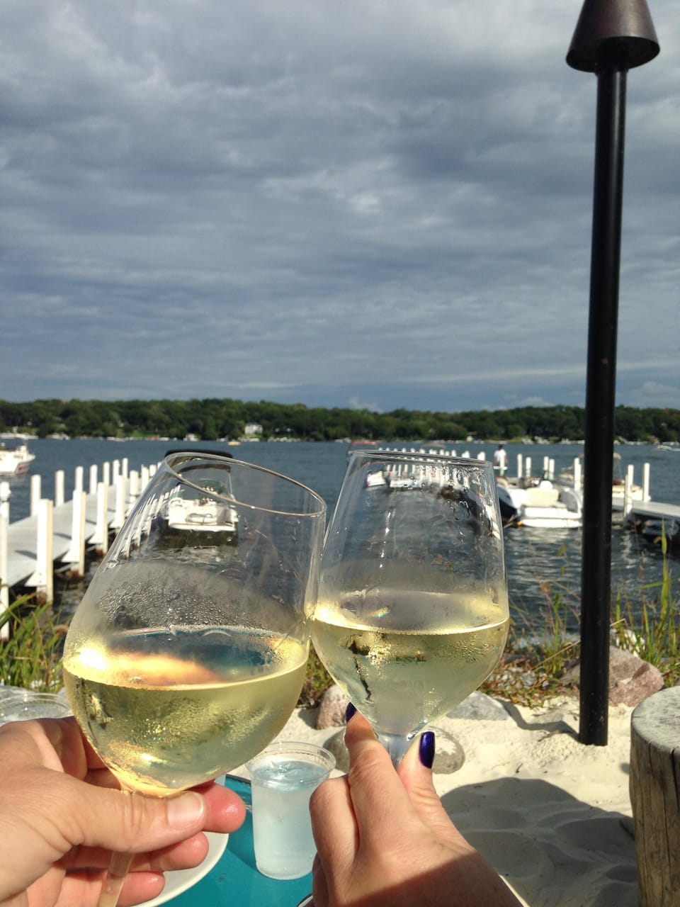 Sit in the sand for Cocktails on the lake at Pier 290