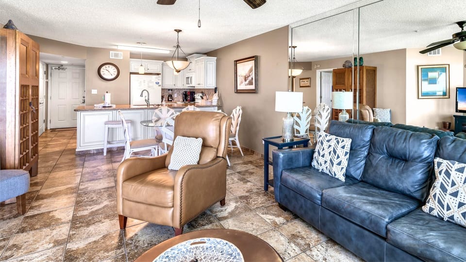 The living area flows into the kitchen for easy togetherness.