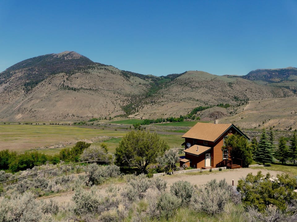 Our vacation home sits on a 1.5 acre fenced property amidst Forest Service Land