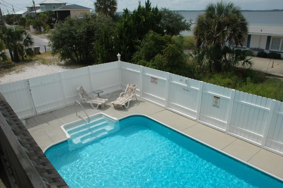 Pool view looking from balcony of 1 of 3 Master Suites.  Pool can be heated.