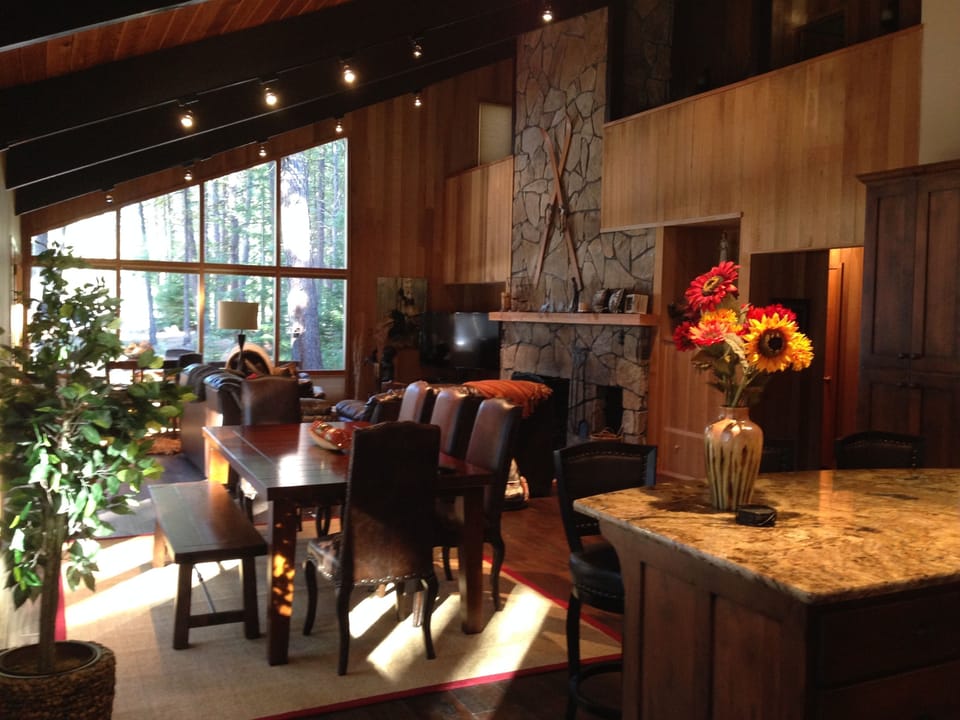 View from kitchen looking out at the golf course and 15th green. Dinning for 12 