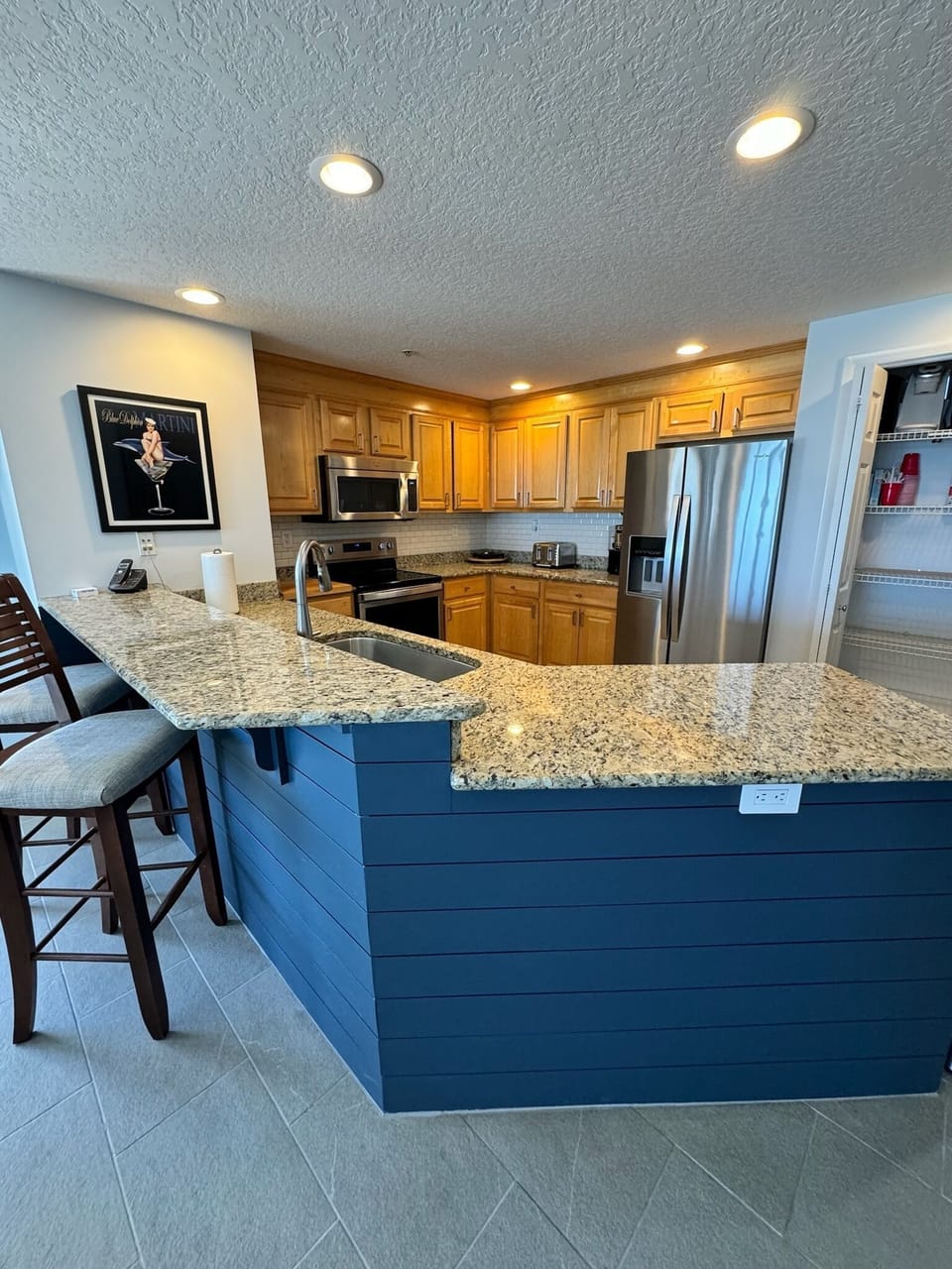 Plenty of counter space accented with ship lap siding. 