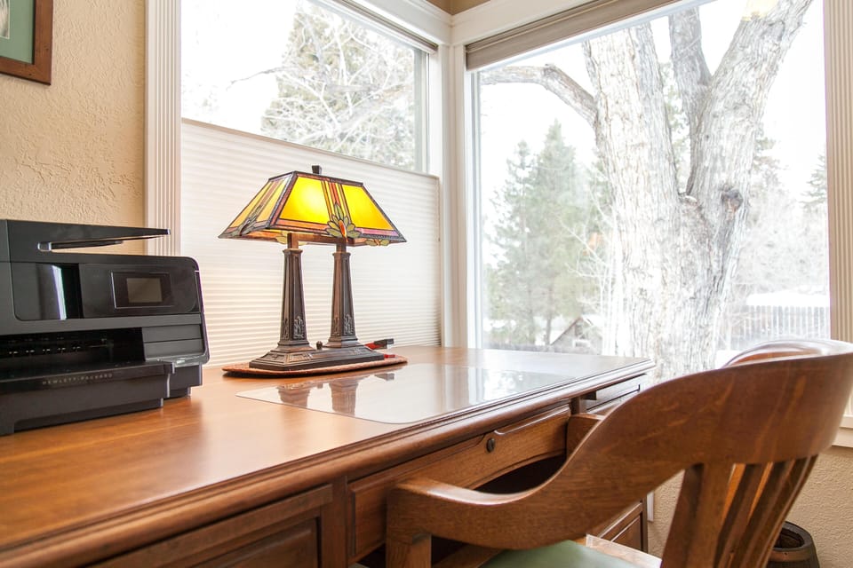 Desk with wireless printer in this QUEEN bedroom.