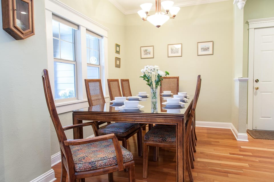 Lovely dining room adjacent to the living and kitchen. Easily seats 8.