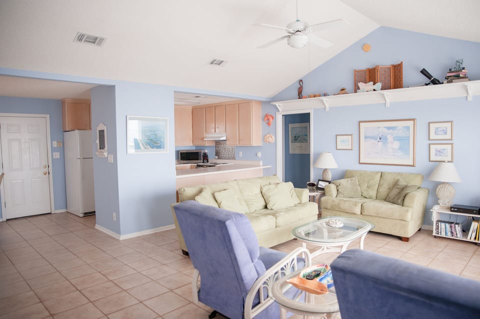 Plenty of comfortable den seating, including 2 glider recliners