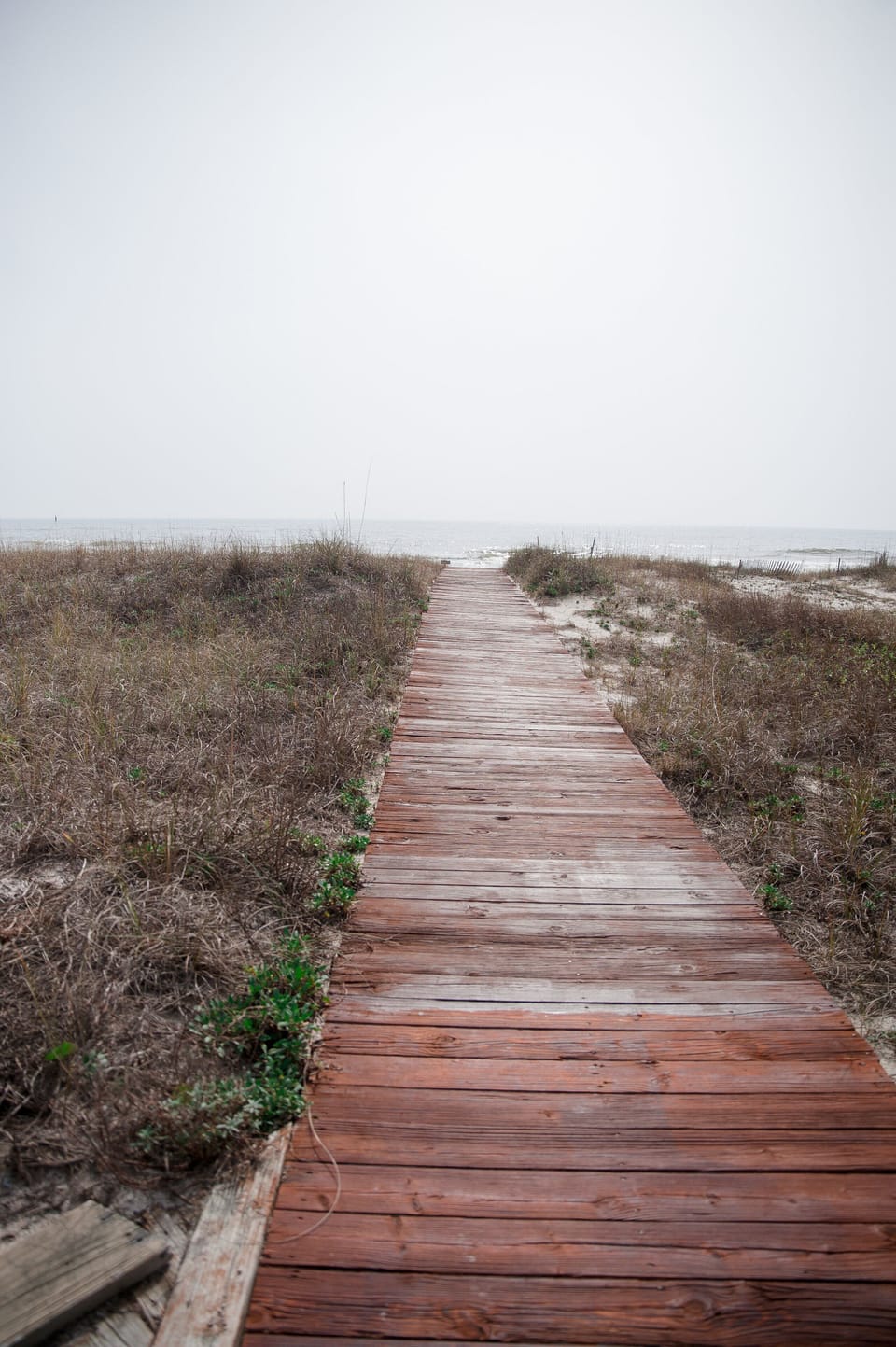 Many brides have walked down this boardwalk to their Gulf front weddings.