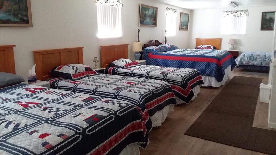 Upstairs:  2 king beds, 4 single beds