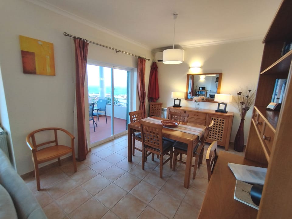 Dining area with writing desk in the foreground