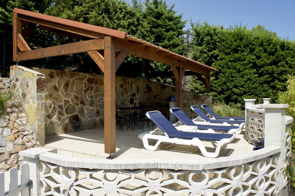 Pergola on upper swimming pool terrace