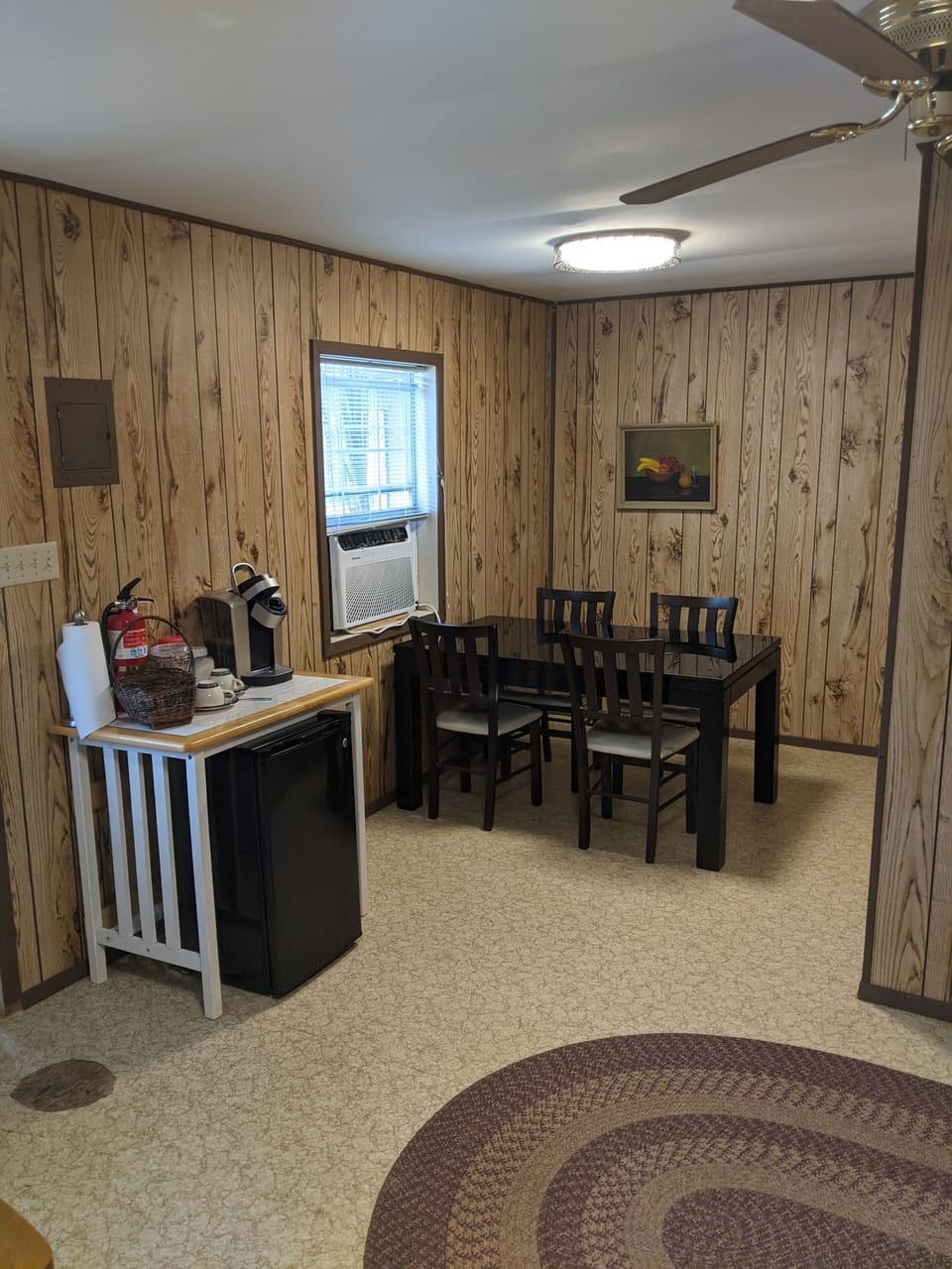 Table area in the Guest House.  Small fridge & Coffee station.