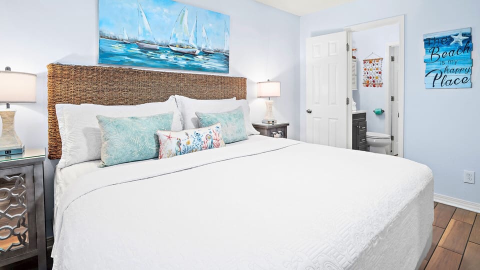 Wake rested in this bright, beautifully styled king bedroom.