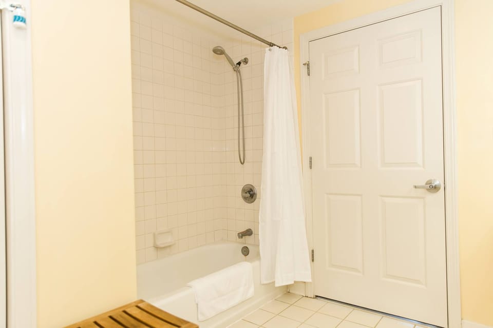 Tub/shower, with hand wand to hose the littles off.  