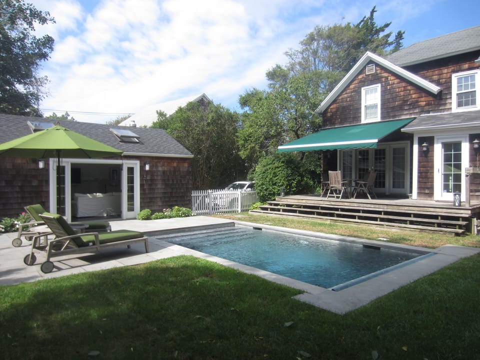 View 2 Heated Pool with the Poolhouse
