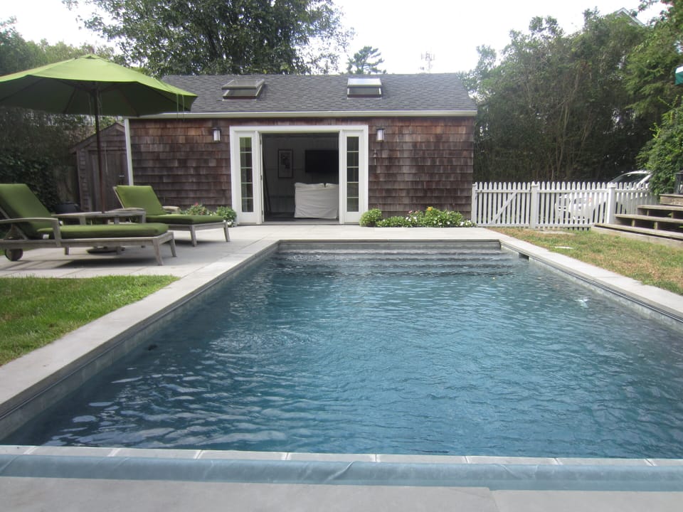 View of Heated Pool + Poolhouse