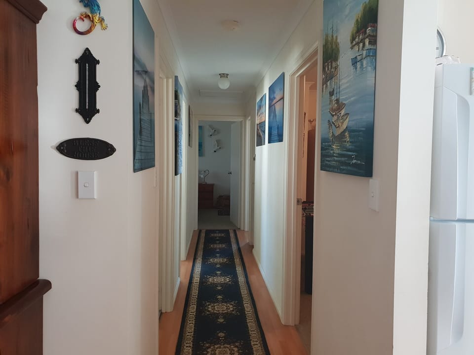 Passageway through to bedrooms and main bathroom.