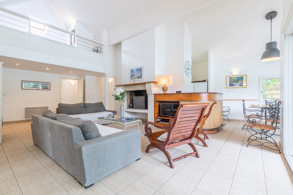 Take a seat and enjoy a movie in the spacious living area.