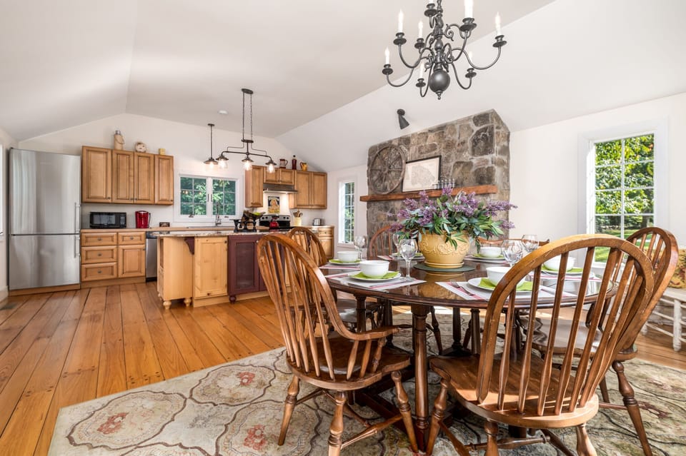 Large kitchen with working fireplace and dining table for six or more