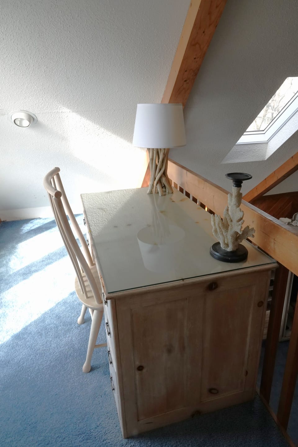 There is a desk upstairs if you need to "work from home". 
