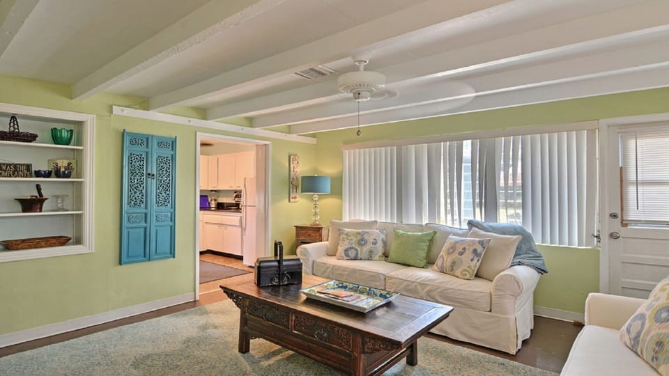 Easy access to kitchen (left) and outdoor (right) BBQ grill and dining.