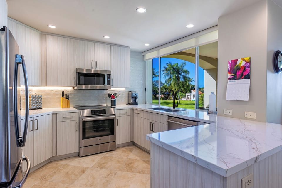 Our newly remodeled kitchen with new Bosch induction stove and stainless steel appliances
