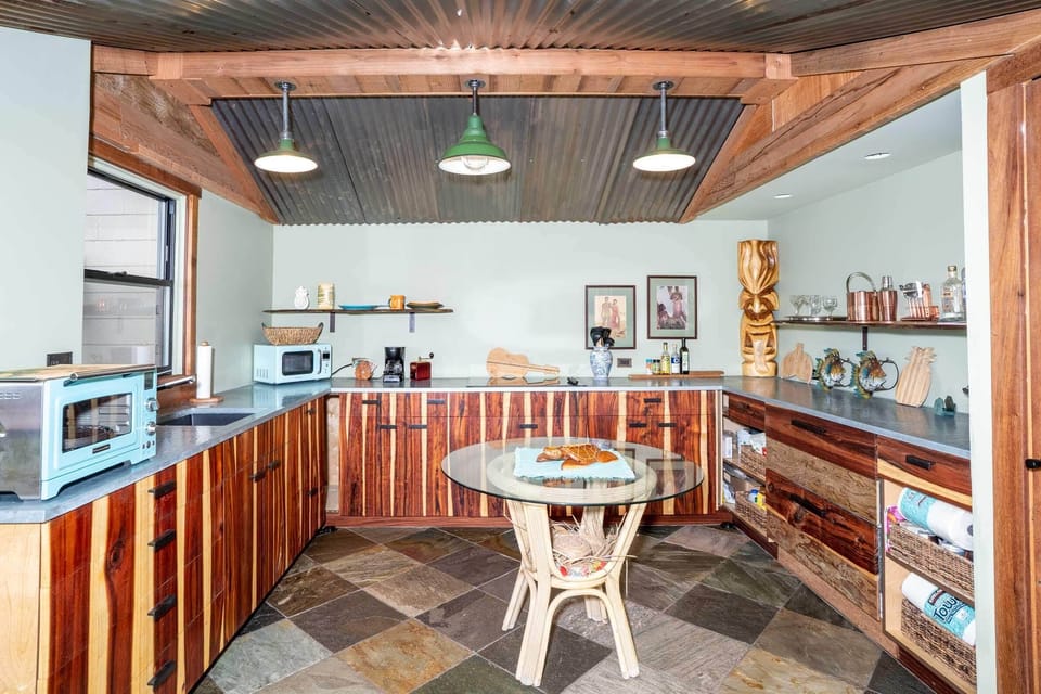 Open tin roof kitchen ceiling