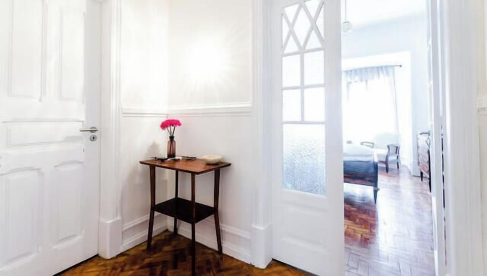Corner of the hallway, showing the doors to the Purple room (on the left) and the Silver room (on the right).