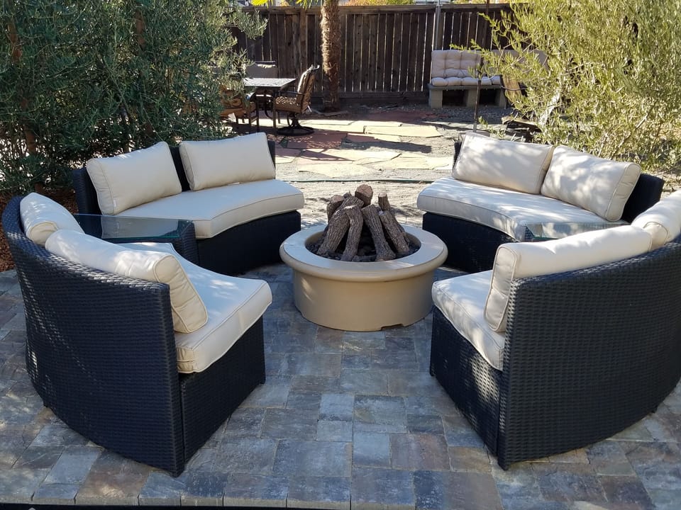 Sip wine by the fire pit. Available upon request.