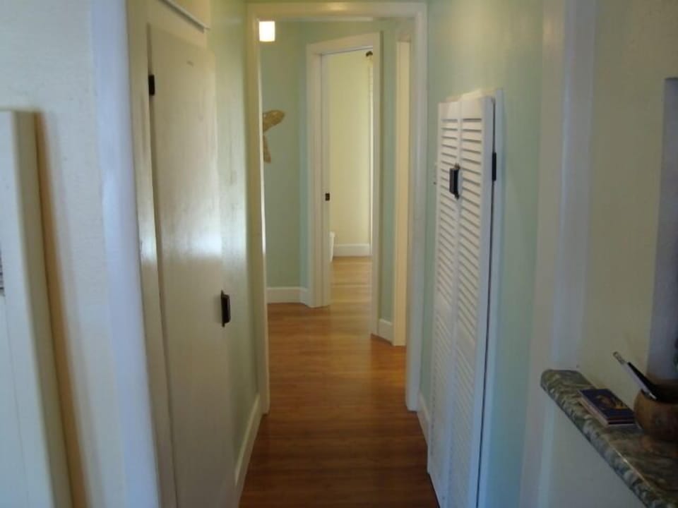 Hall to the three back bedrooms.