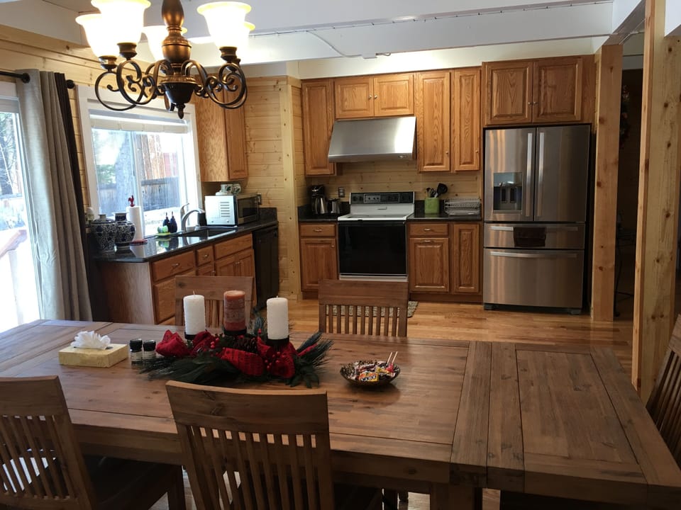 Kitchen: granite countertop, brand new appliances, plenty of cooking ware, plate