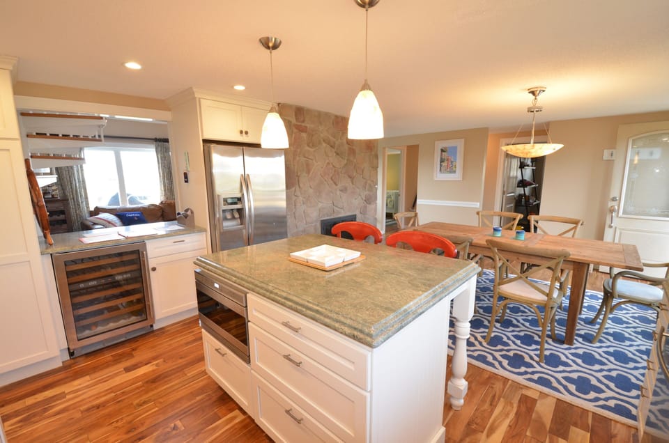 Fully updated kitchen with gorgeous granite and a dual-zone wine fridge