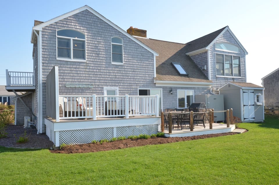 Incredible two level deck with outdoor kitchen & outdoor shower