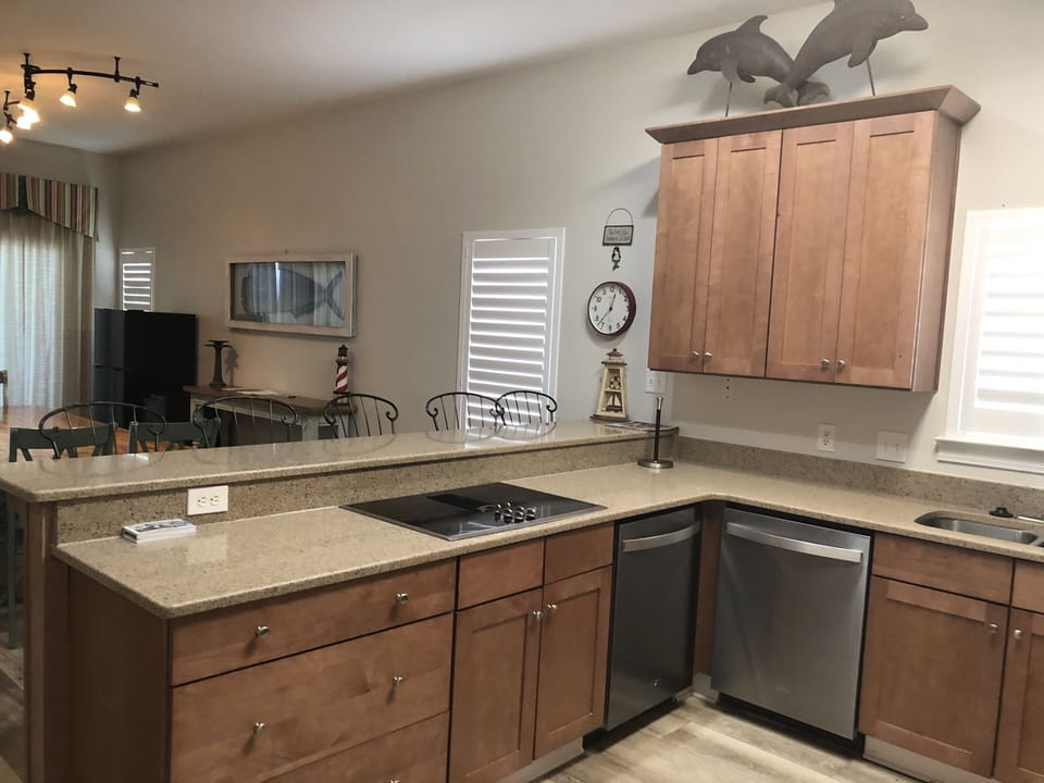 Kitchen includes 25' refrigerator, range, oven, and two dishwashers.