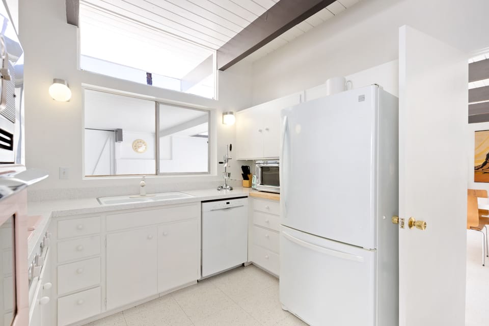 Updated kitchen with modern amenities including convection oven and  microwave.
