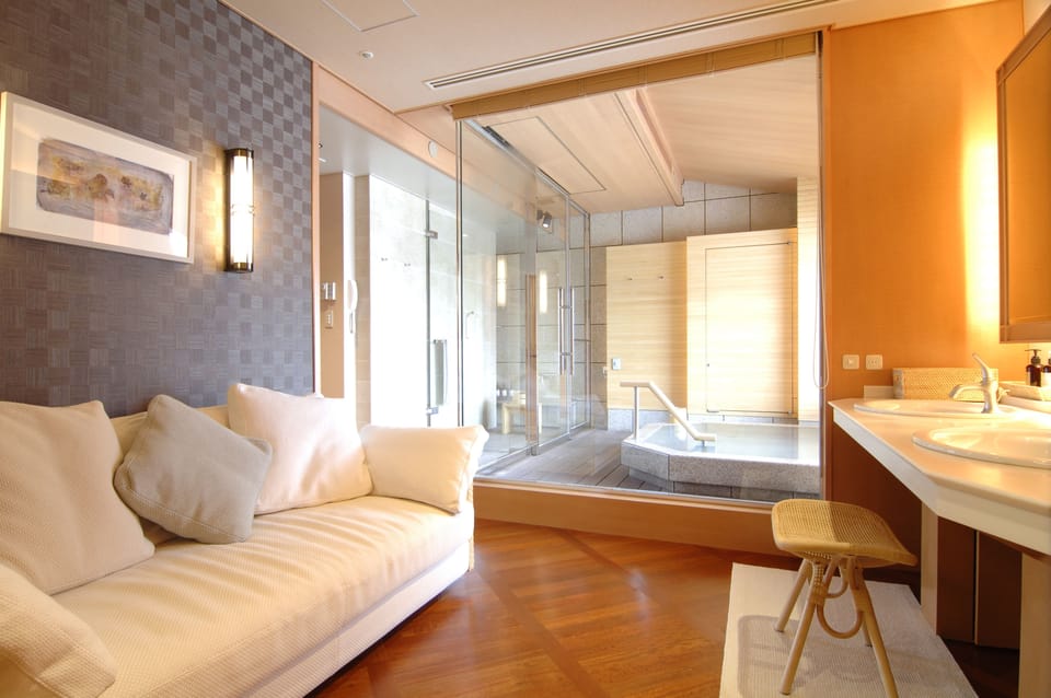 Japanese-Style Deluxe Room with Open-Air Bath A | Living area | LCD TV