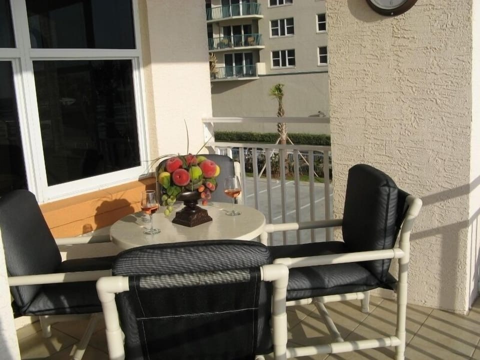 Balcony with Table and Chairs