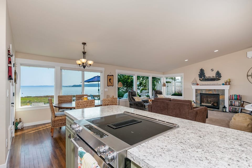 Kitchen has new appliances and a gorgeous bay view making cooking a delight.