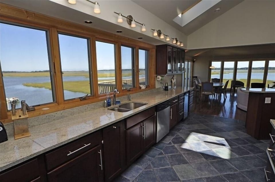 Someone has to wash dishes, even on vacation.  With this view, who minds?