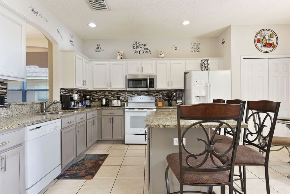 Kitchen and breakfast nook. Kitchen updated with granite counters