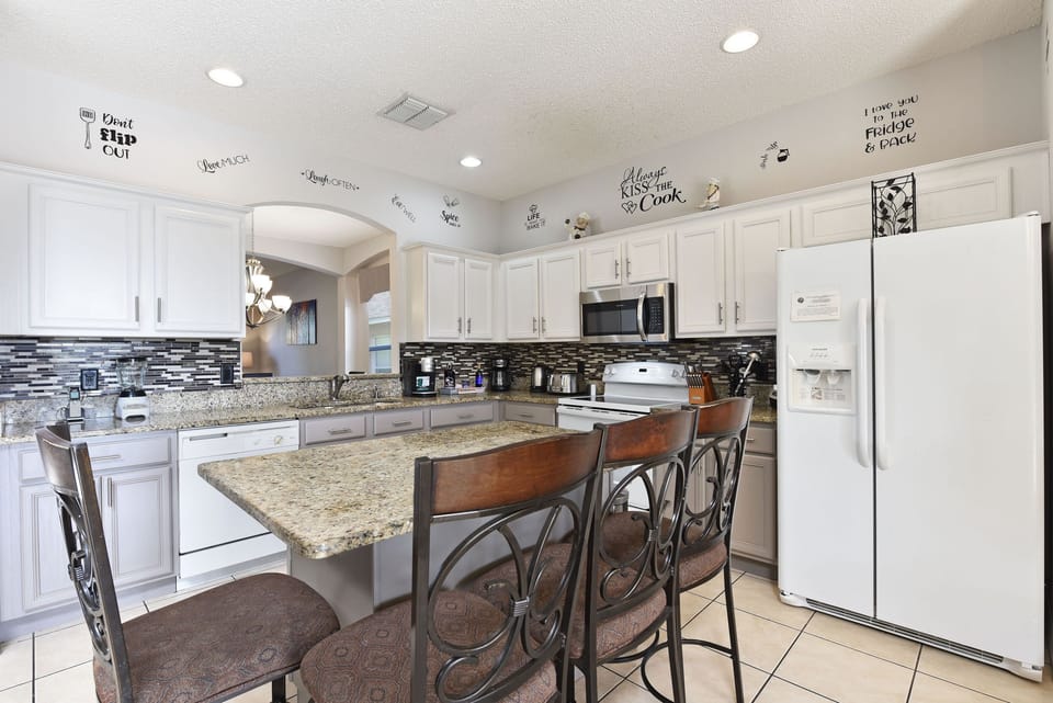 Kitchen and breakfast nook. Kitchen updated with granite counters