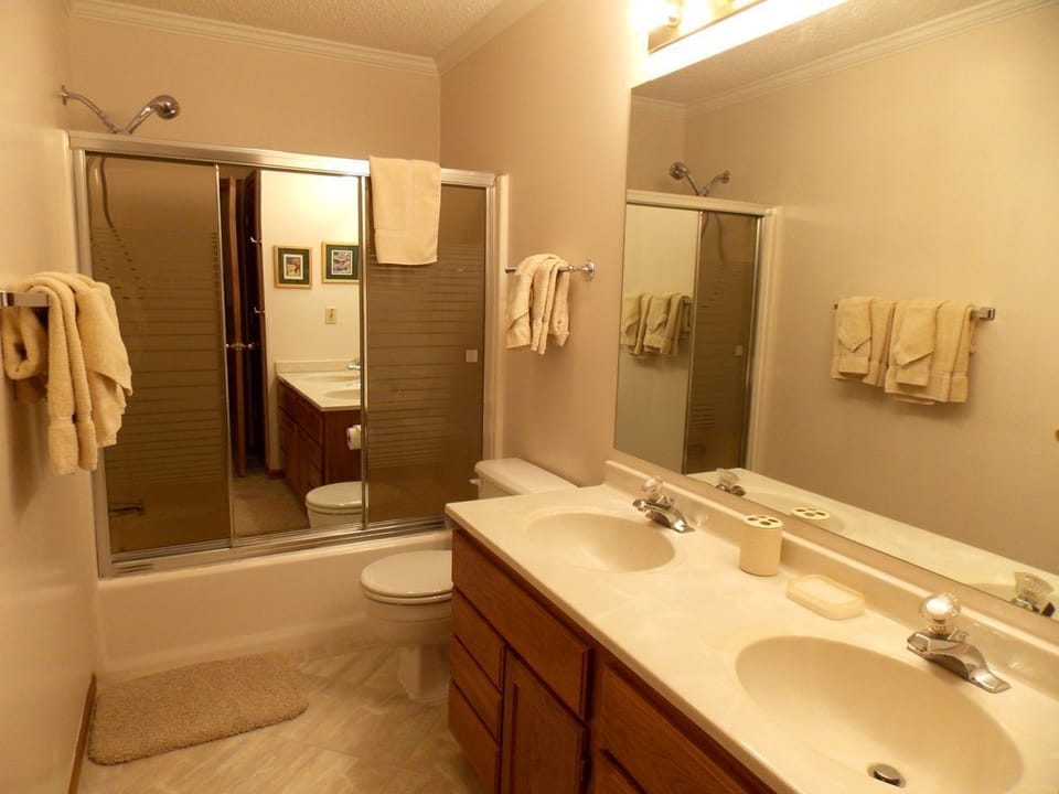 Shared bath between two of the bedrooms on the second floor