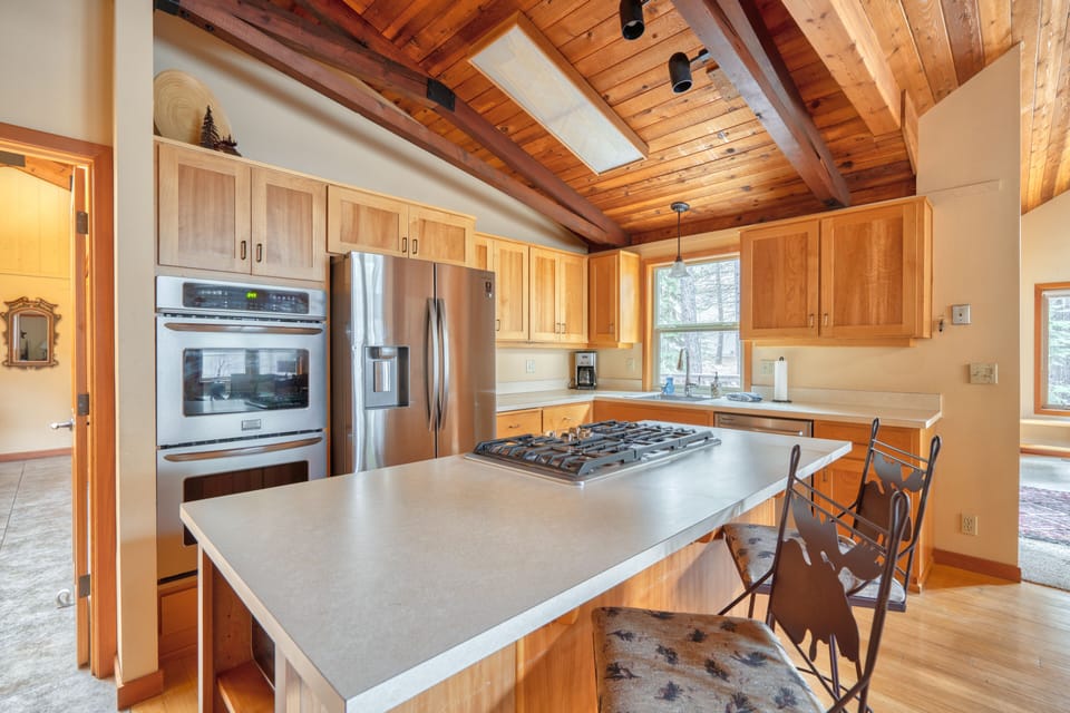 Fully stocked chefs kitchen with double wall oven