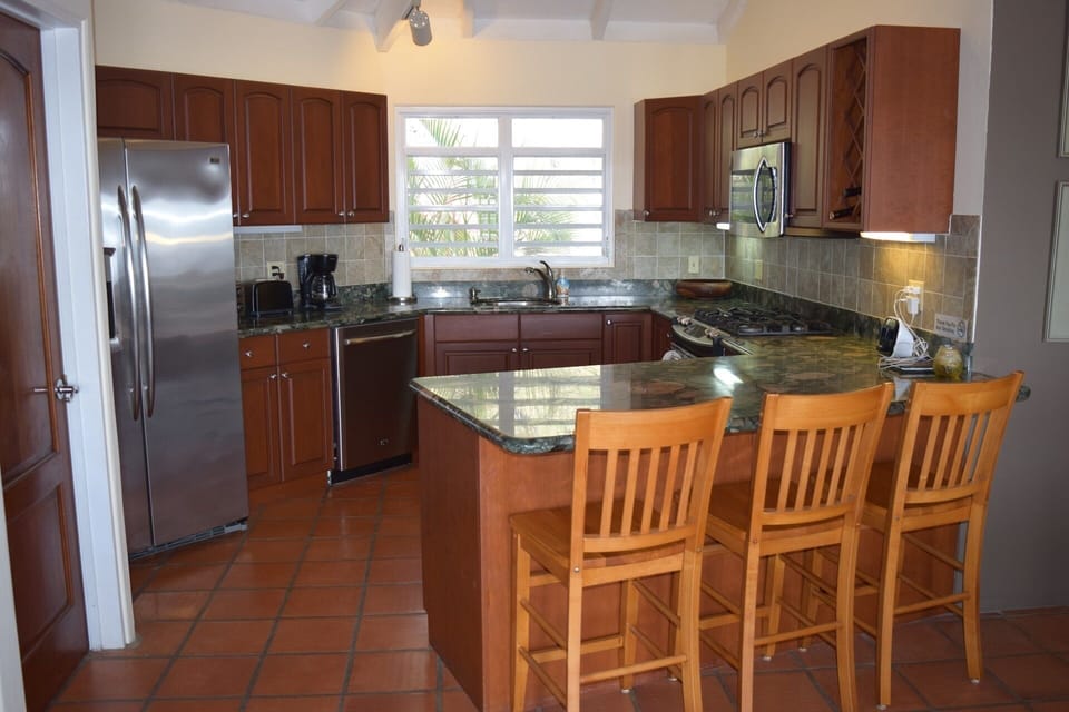 Kitchen with stainless steel appliances and granite countertops
