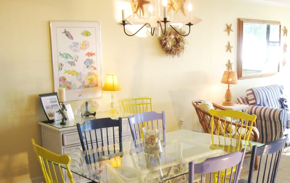 Beachy dining area for 6 is handy to the kitchen.  