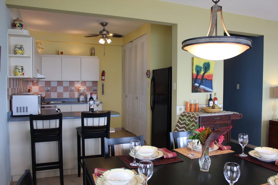Well equipped kitchen and breakfast bar. Laundry in back right closets.
