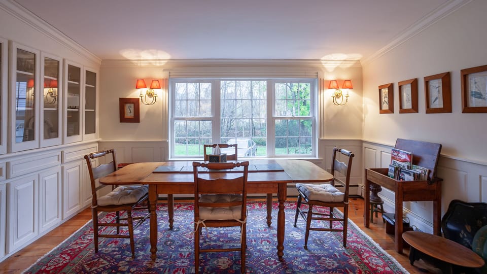 Bright and cheery dining room open to kitchen and living room.