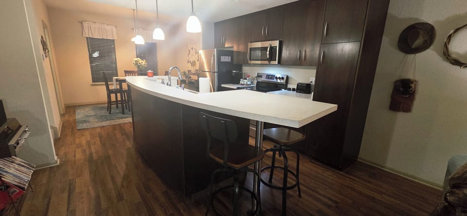 The well stocked kitchen also has a handy counter for coffee and crumpets.