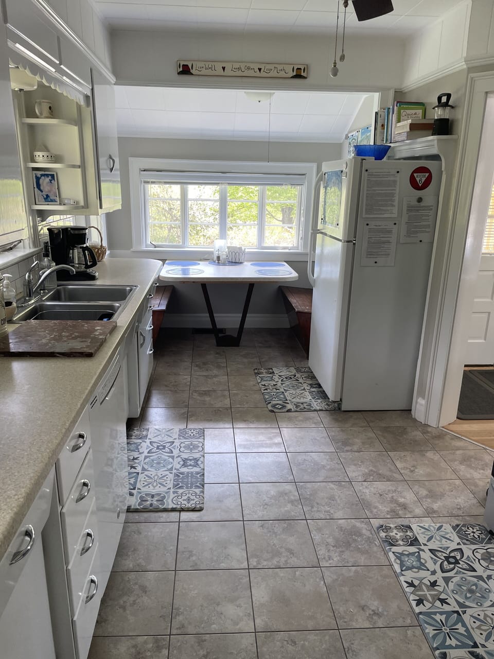 kitchen, breakfast nook at 
back of photo
