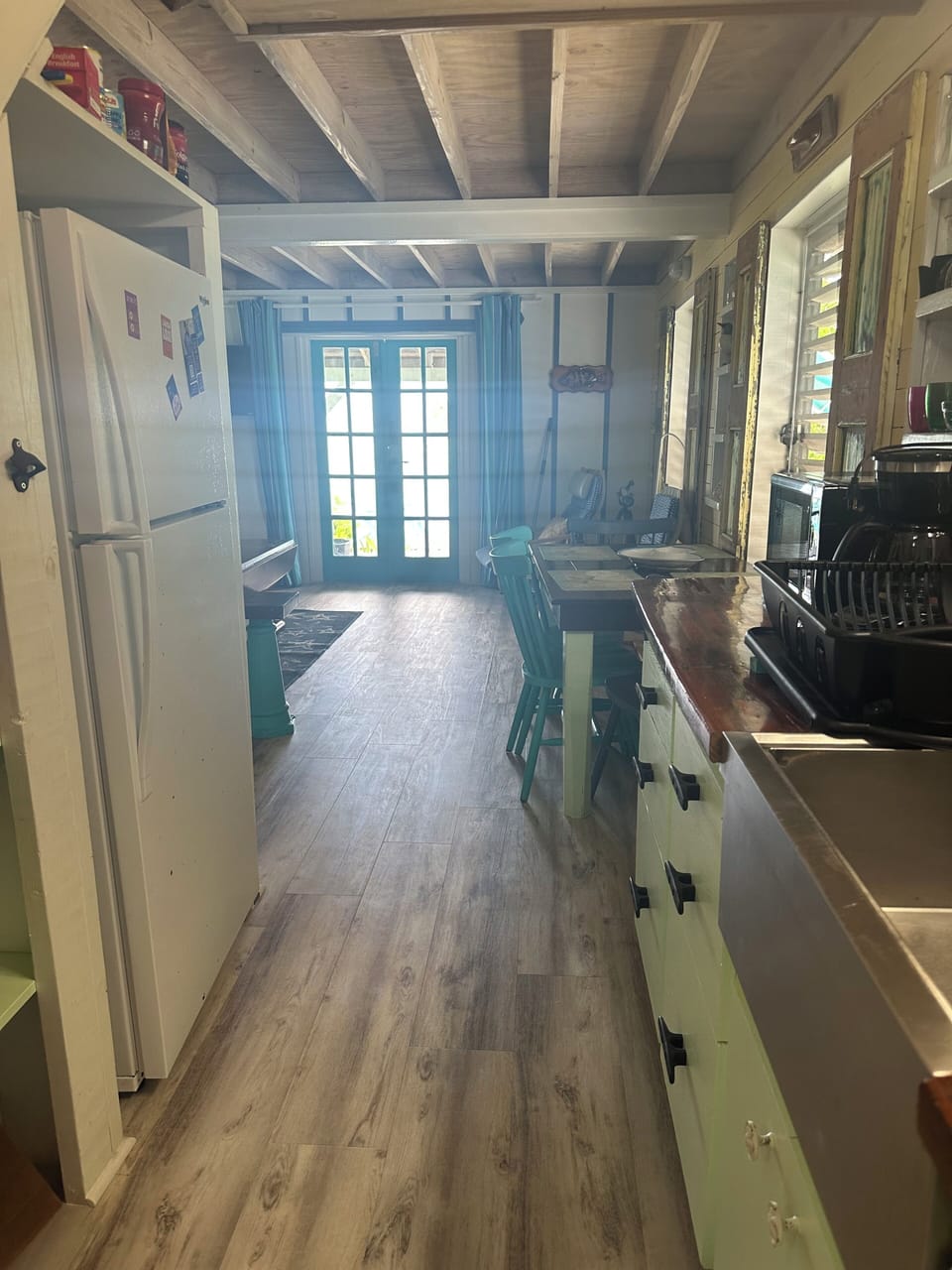 Kitchen conveniently located off living area and beach access