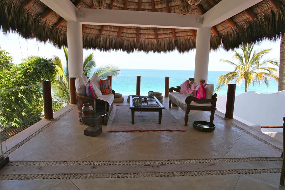 Outdoor living room on main level, fantastic for sunsets and sunrises
